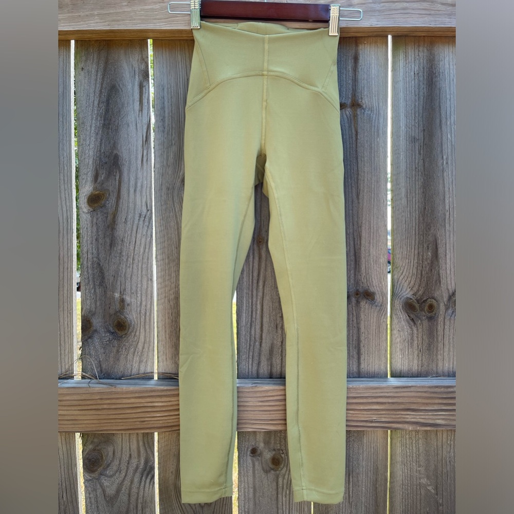 Lululemon Bronze Green Instill Legging 25” size 2